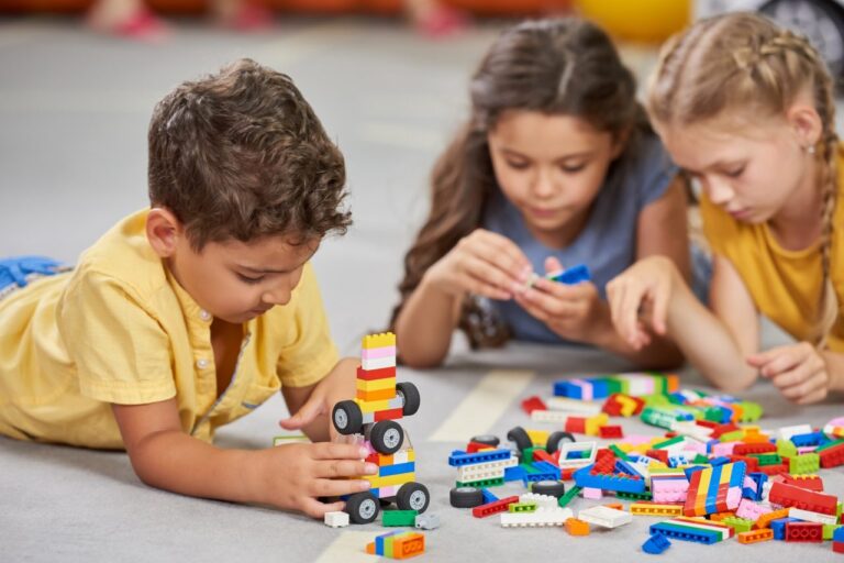 children-playing-together-in-the-classroom-in-kindergarten-